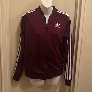 Vintage adidas’s size small burgundy track suit jacket zip  up and zipper pocket